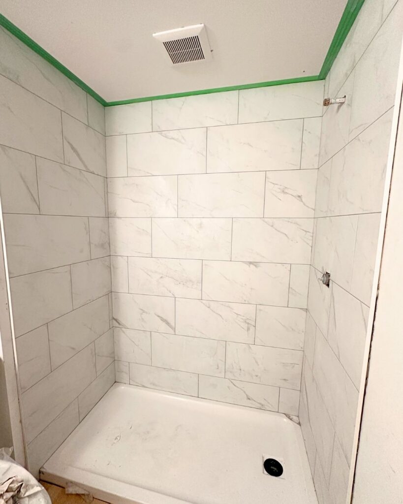shower tile installation, tile bathroom shower, marble tile install
